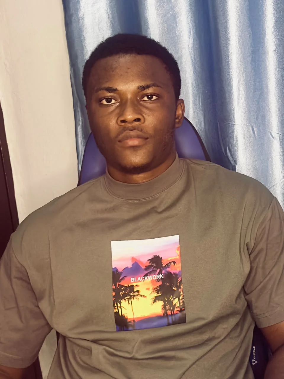 Godwin in a relaxed portrait